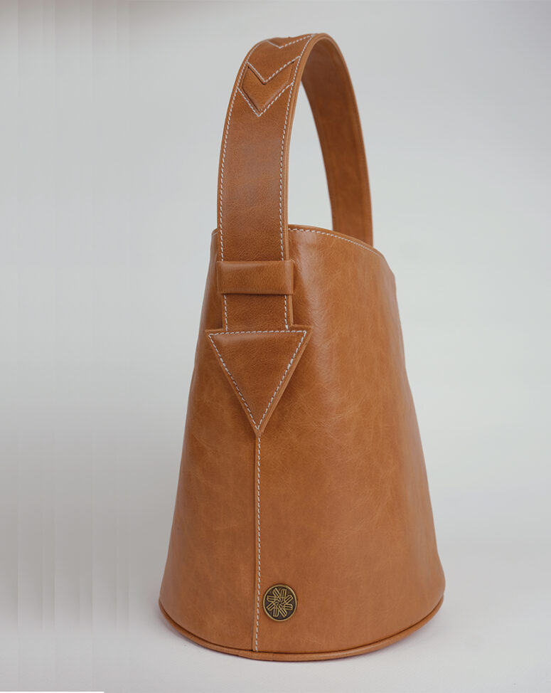 The Arrow, MakladWali's genuine leather take on the barrel bag.